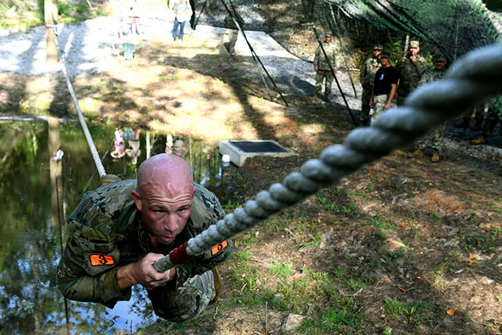 Staff Sgt. Mitchell Scofield, slowly pulls himself to a marker (not pictured) on a rope during the commando’s crawl portion of an obstacle course event at the Army National Guard’s 2020 Best Warrior Competition at Camp Shelby, Mississippi, Sept. 16. Scofield, a cavalry scout and instructor at the Mississippi Army National Guard’s Regional Training Institute, would earn Noncommissioned Officer of the Year honors in the competition, which took place Sept. 13-16.